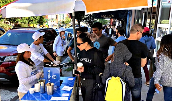 Mobile beer hawker backpack used at a London open-air festival providing fast professional drink service for live audiences.