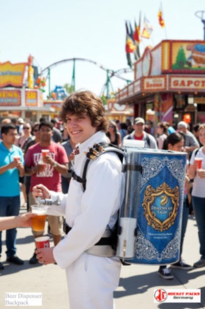 Beer vendor backpack delivering drinks at Nashville live music street event.